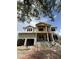 New two-story home under construction, featuring a spacious design and covered entryway at 567 Luzon Ave, Tampa, FL 33606