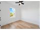 Bedroom with a window and hardwood floors at 2365 Bahia Vista St, Sarasota, FL 34239