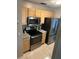 Kitchen with stainless steel appliances and granite countertops at 10911 Hachita Dr, Port Richey, FL 34668