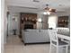 Living room featuring a brick fireplace and comfortable seating at 10911 Hachita Dr, Port Richey, FL 34668
