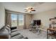Home office with desk, computer, and comfortable couch at 31396 Cabana Rye Ave, San Antonio, FL 33576
