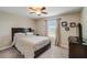 Cozy bedroom with a double bed, large window, and TV at 31396 Cabana Rye Ave, San Antonio, FL 33576