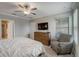 Spacious main bedroom with dresser, chair, and en-suite bathroom at 31396 Cabana Rye Ave, San Antonio, FL 33576