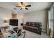 Home office with a desk, computer, and comfortable couch at 31396 Cabana Rye Ave, San Antonio, FL 33576
