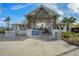 Entrance to the community with a welcoming sign and landscaping at 31396 Cabana Rye Ave, San Antonio, FL 33576