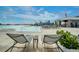 Relaxing pool deck with lounge chairs and a view of the lagoon at 31396 Cabana Rye Ave, San Antonio, FL 33576