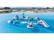 Inflatable obstacle course floating on a lagoon at 31396 Cabana Rye Ave, San Antonio, FL 33576