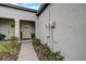Light yellow front door and walkway leading to the home's entrance at 31396 Cabana Rye Ave, San Antonio, FL 33576