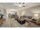Open living room with a neutral color scheme and view of kitchen at 31396 Cabana Rye Ave, San Antonio, FL 33576