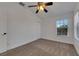Charming bedroom with window, ceiling fan and closet at 20026 Heritage Point Dr, Tampa, FL 33647
