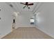 Bright bedroom with neutral carpeting and ceiling fan at 20026 Heritage Point Dr, Tampa, FL 33647