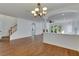 Bright dining room with hardwood floors and a view to the living room at 20026 Heritage Point Dr, Tampa, FL 33647