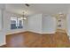Open dining area with hardwood floors and view into the foyer at 20026 Heritage Point Dr, Tampa, FL 33647