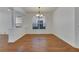 Formal dining room with hardwood floors and chandelier at 20026 Heritage Point Dr, Tampa, FL 33647