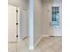 Bright entryway with tile floors and neutral colors at 20026 Heritage Point Dr, Tampa, FL 33647
