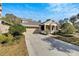 Two-story house with attached garage and front porch at 20026 Heritage Point Dr, Tampa, FL 33647