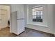 Functional kitchen with refrigerator and tile floor at 20026 Heritage Point Dr, Tampa, FL 33647