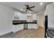 Spacious kitchen with white cabinets, granite countertops and a breakfast bar at 20026 Heritage Point Dr, Tampa, FL 33647