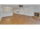 Spacious living area with hardwood floors and fireplace at 20026 Heritage Point Dr, Tampa, FL 33647