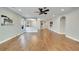 Large living room with hardwood floors and ceiling fan at 20026 Heritage Point Dr, Tampa, FL 33647