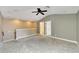 Spacious loft area with grey walls and carpet flooring at 20026 Heritage Point Dr, Tampa, FL 33647