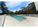 Inviting community pool with plenty of lounge chairs at 9658 Sweetwell Pl, Riverview, FL 33569