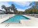 Inviting community pool with ample lounge chairs at 9658 Sweetwell Pl, Riverview, FL 33569