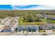 Aerial view of townhouses, roads, and landscape at 9658 Sweetwell Pl, Riverview, FL 33569