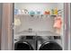 Laundry area featuring modern Samsung washer and dryer at 9658 Sweetwell Pl, Riverview, FL 33569