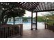 Relaxing community pool area with pergola and deck at 4115 Chatham Oak Ct # 218, Tampa, FL 33624