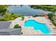 Community pool with spacious deck and lake views at 4115 Chatham Oak Ct # 218, Tampa, FL 33624