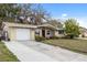 Image 1 of 15: 3817 Woodcock Dr, New Port Richey