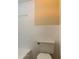 Simple bathroom with a bathtub and toilet at 7820 Sycamore Dr, New Port Richey, FL 34654