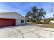 Home with attached garage and large driveway at 7820 Sycamore Dr, New Port Richey, FL 34654