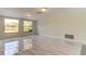 Living room with large windows and tile floors at 7820 Sycamore Dr, New Port Richey, FL 34654