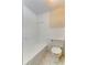 Clean bathroom with a bathtub and toilet at 7820 Sycamore Dr, New Port Richey, FL 34654