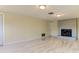 Living room with fireplace and tile floors at 7820 Sycamore Dr, New Port Richey, FL 34654