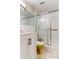 Bright bathroom with white vanity, shower, and updated fixtures at 7820 Sycamore Dr, New Port Richey, FL 34654
