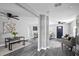 Open living area with grey flooring and neutral color scheme at 3007 Dixie Ave, Sarasota, FL 34234