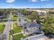 Aerial view of two-story house with landscaped yard, located in a residential neighborhood at 1321 W Arch St, Tampa, FL 33607