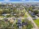 Aerial view of home and neighborhood with skyline visible in the background at 1321 W Arch St, Tampa, FL 33607