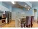 Kitchen with stainless steel appliances and breakfast bar at 2409 Heather Manor Ln, Lutz, FL 33549