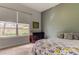 Bedroom with a queen bed and a dark dresser at 2409 Heather Manor Ln, Lutz, FL 33549