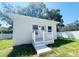 Newly constructed home with a modern design and attractive landscaping at 0 Pevetty, Plant City, FL 33563