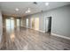 Large living area with vinyl flooring and access to other rooms at 0 Pevetty, Plant City, FL 33563