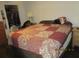 Bedroom with a double bed, nightstands, and a walk-in closet at 2424 W Tampa Bay Blvd # L202, Tampa, FL 33607