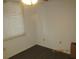 Simple bedroom with dark laminate flooring and a closet at 2424 W Tampa Bay Blvd # L202, Tampa, FL 33607