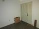 Double-door closet with bi-fold doors in bedroom at 2424 W Tampa Bay Blvd # L202, Tampa, FL 33607