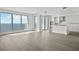 Spacious living room with hardwood floors and water views at 2910 W Barcelona St # 2102, Tampa, FL 33629