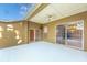 Covered patio with access to the pool area at 2634 Brookville Dr, Valrico, FL 33596
